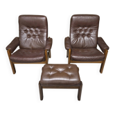 Paire de fauteuils cuir et un ottoman Suède 1970