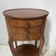Pair of small kidney-shaped commodes in marquetry veneer, 20th century.