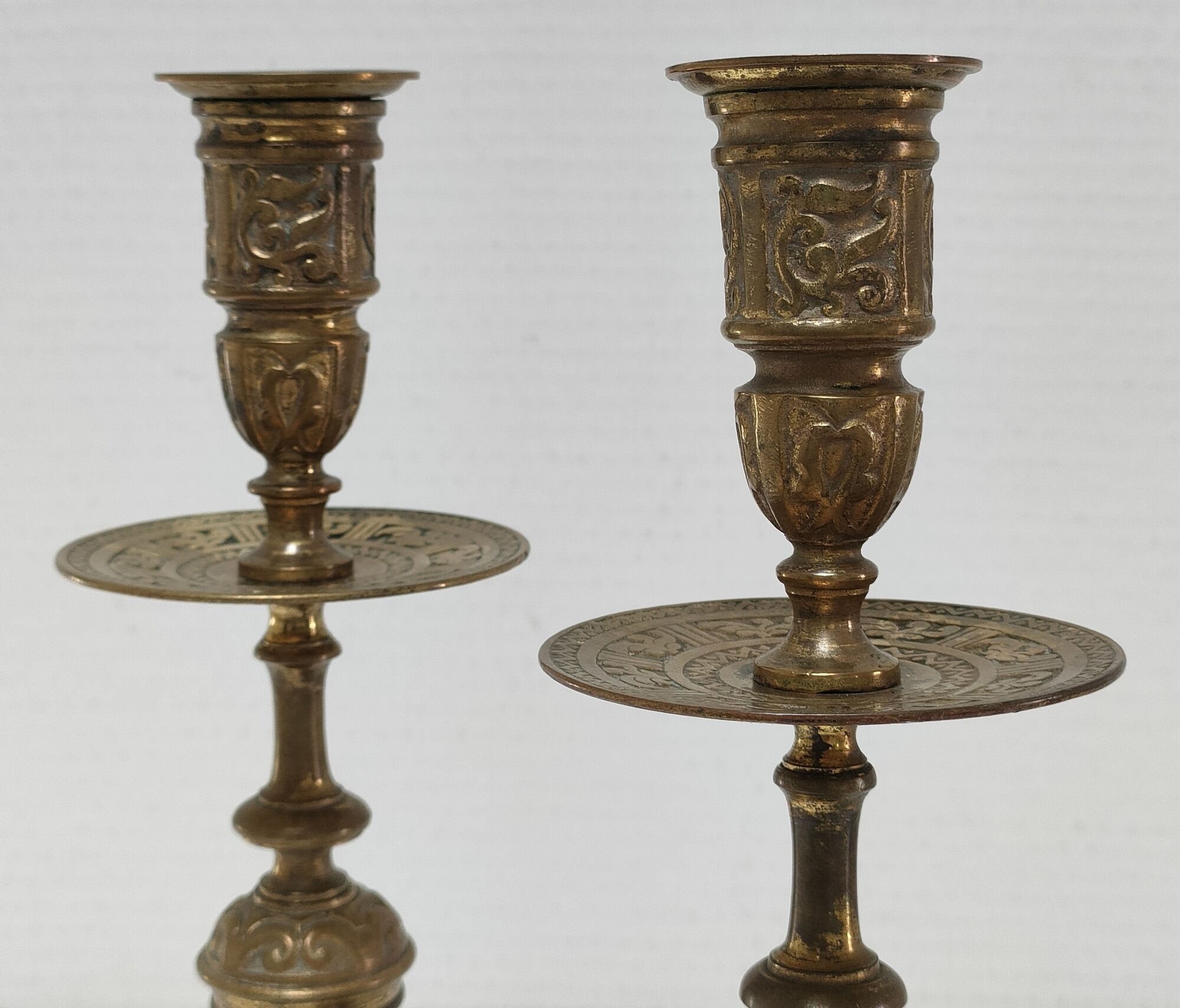 Pair of candle holders patinated bronze floral decoration early twentieth century