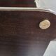 Wooden shelf with gold metal
