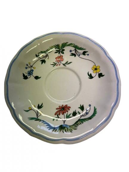 Gien earthenware saucer, decorated with birds of paradise.
