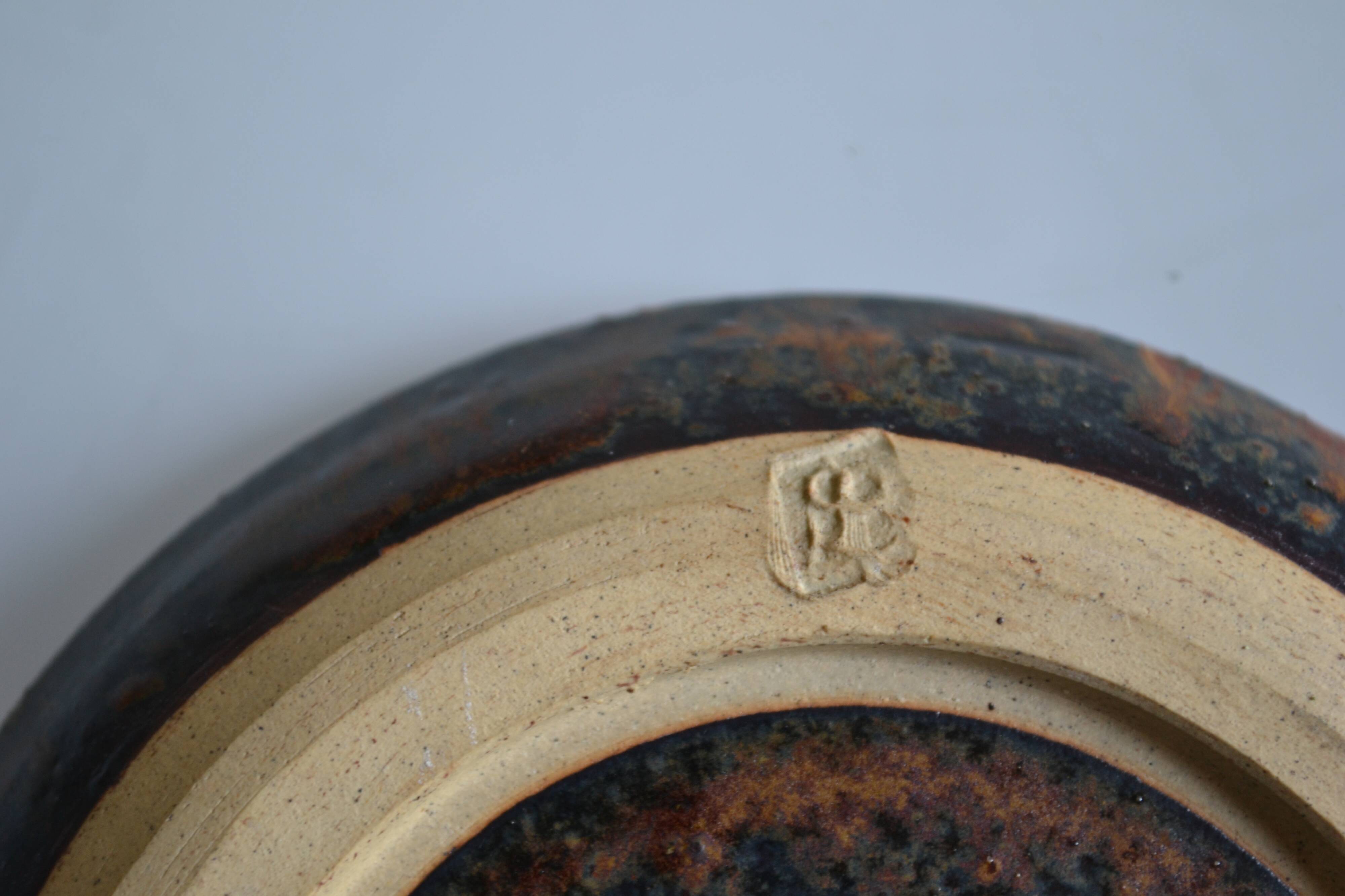 1970s ceramic cup and saucer signed