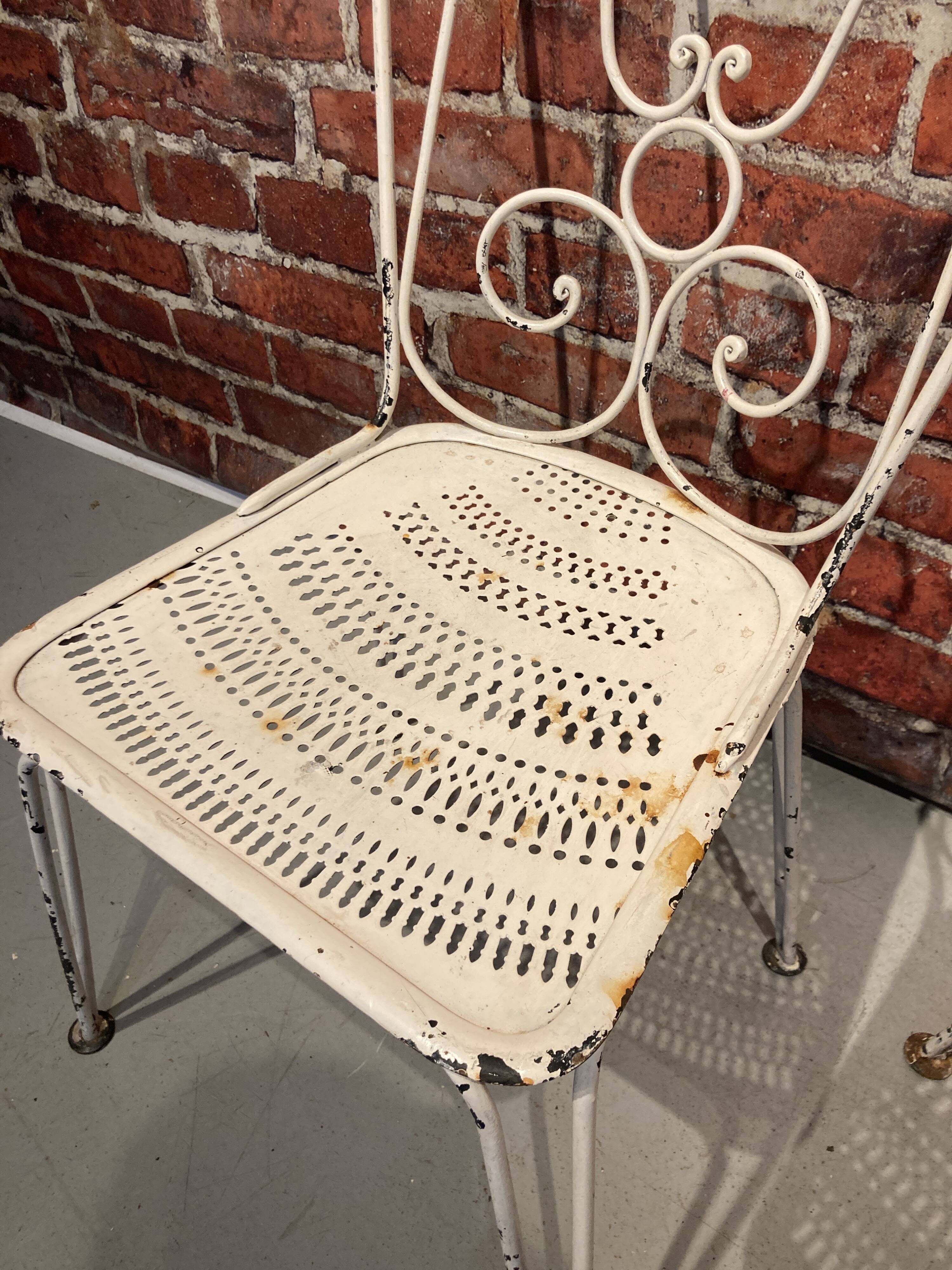 Wrought iron garden set painted white