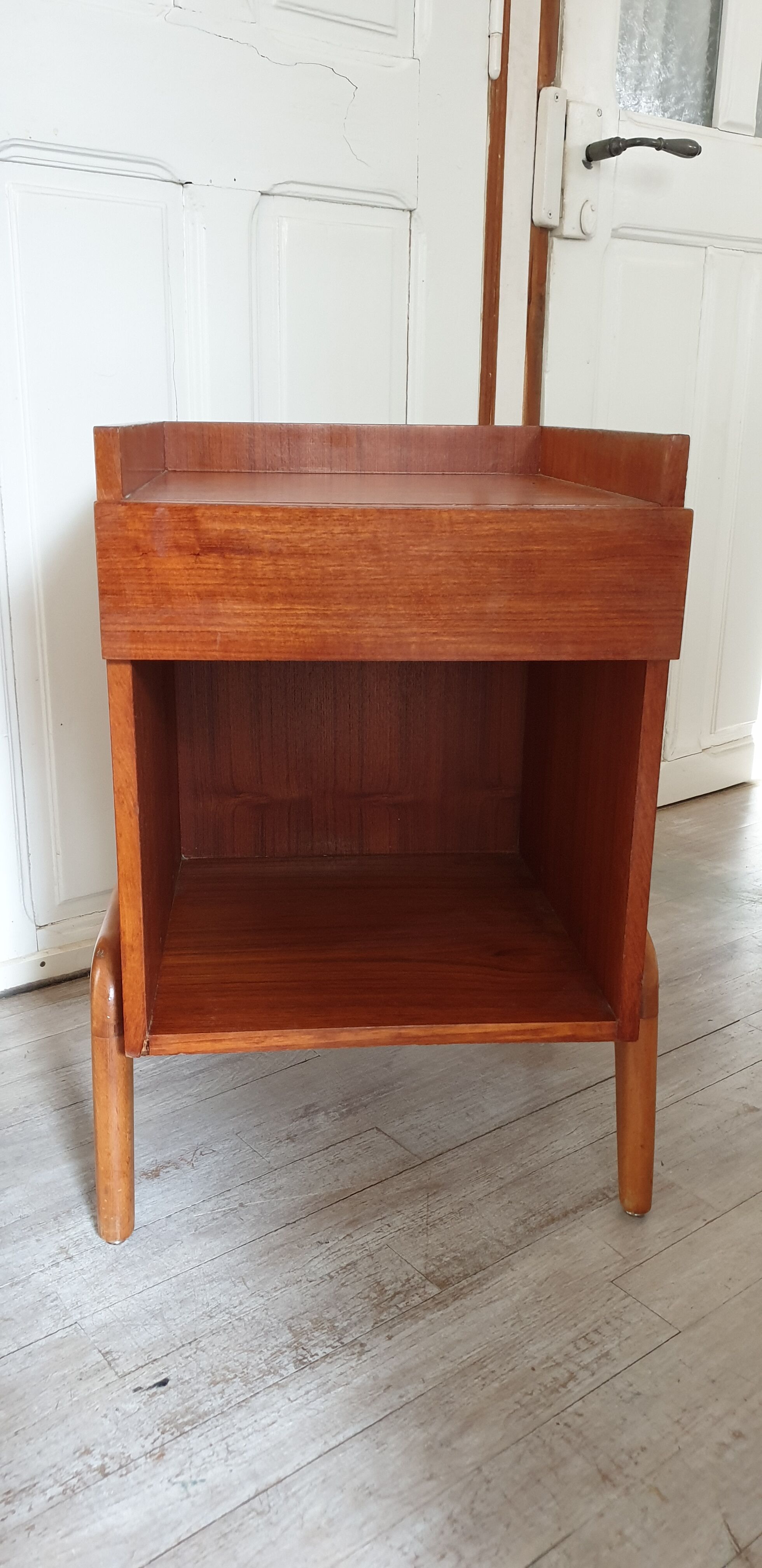 Scandinavian-style compass-footed bedside