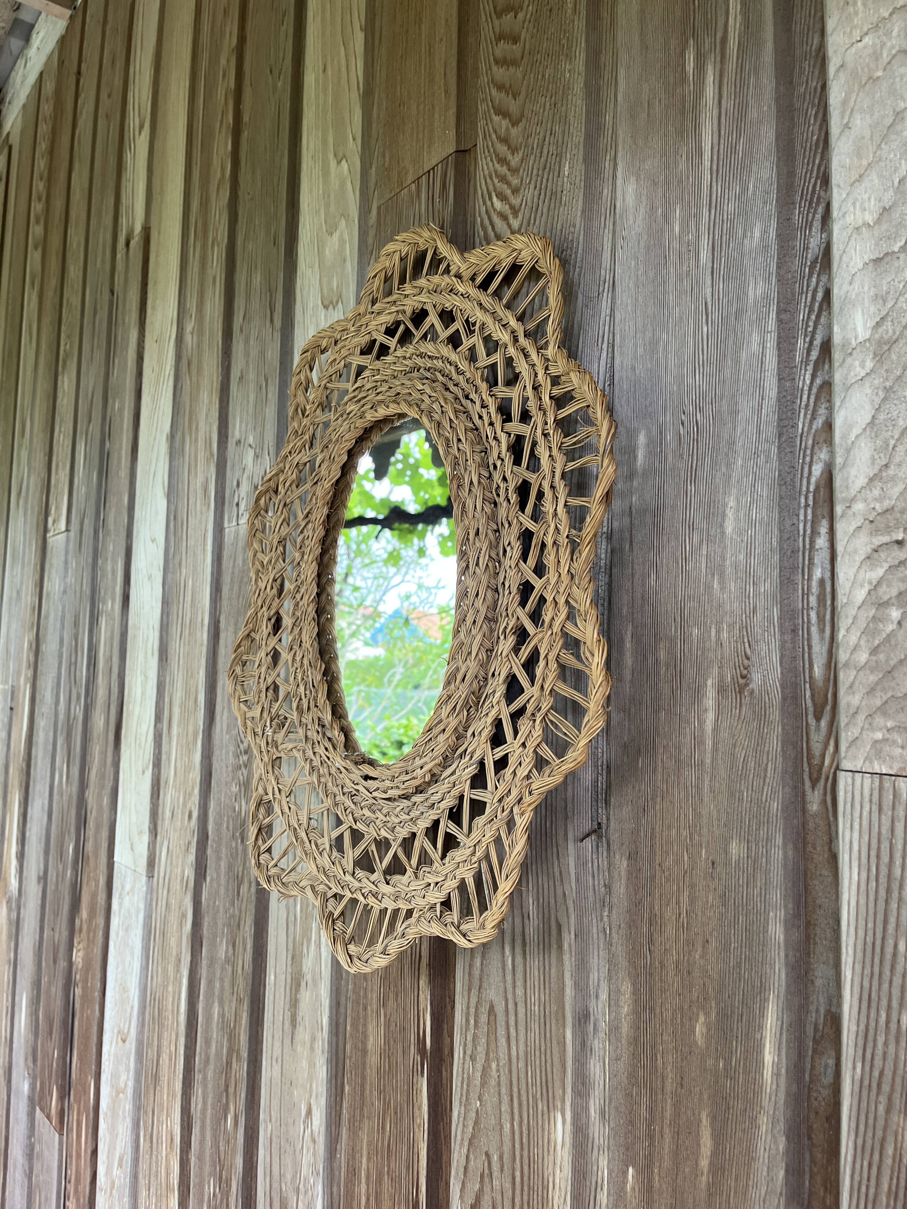 Large braided rattan mirror 1960
