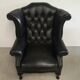 Fauteuil bergère chesterfield cuir noir
