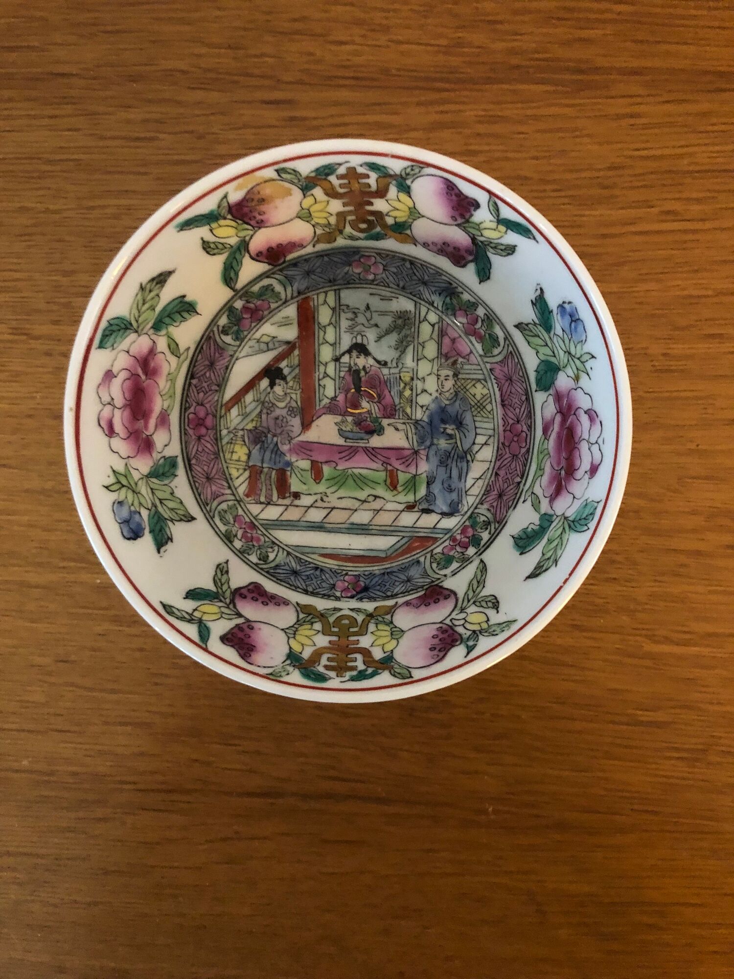 Chinese porcelain bowl on wooden base