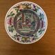 Chinese porcelain bowl on wooden base
