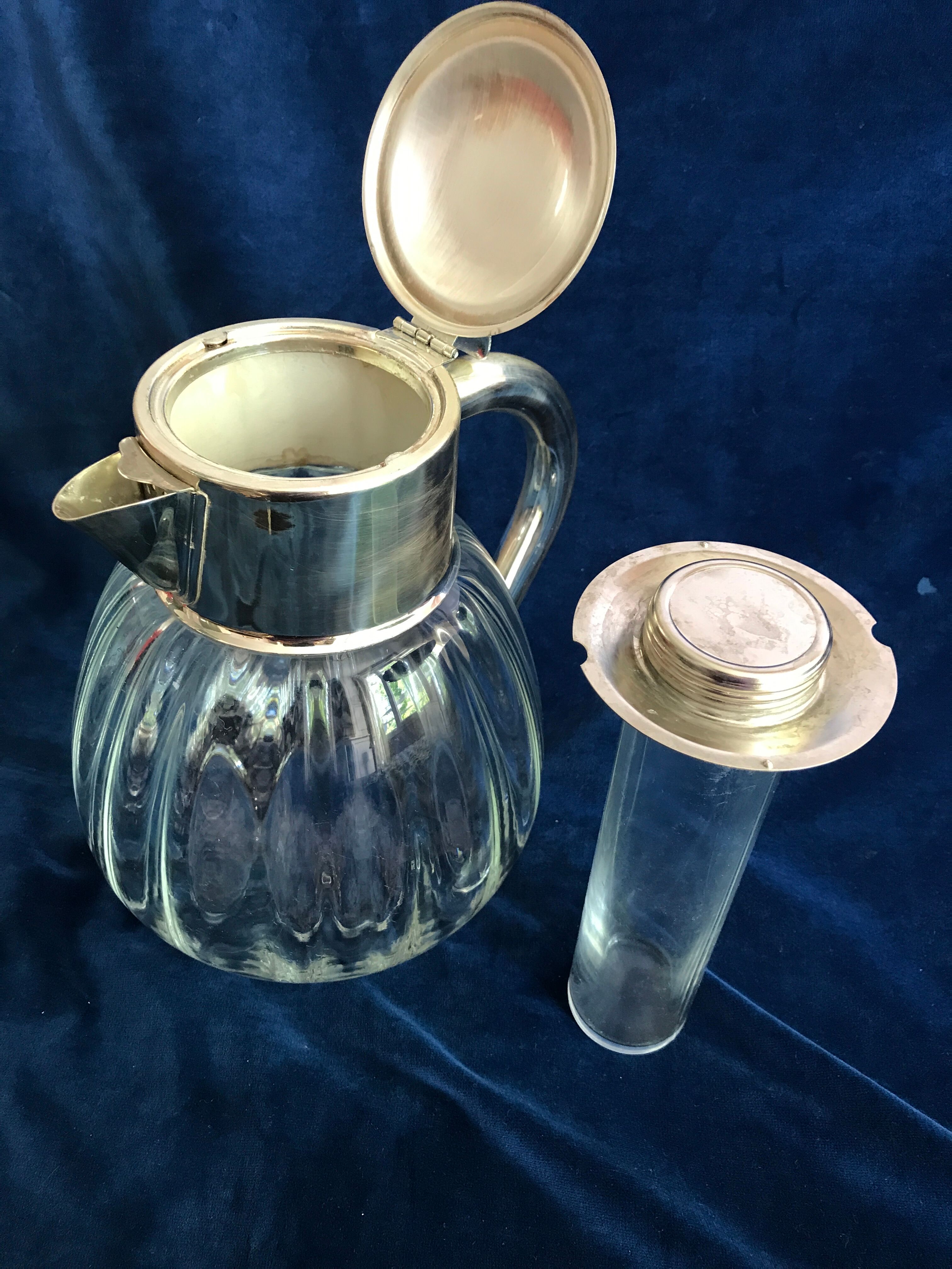 Large pitcher decanter with an ice cooler tube
