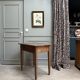 Small antique desk on wheels