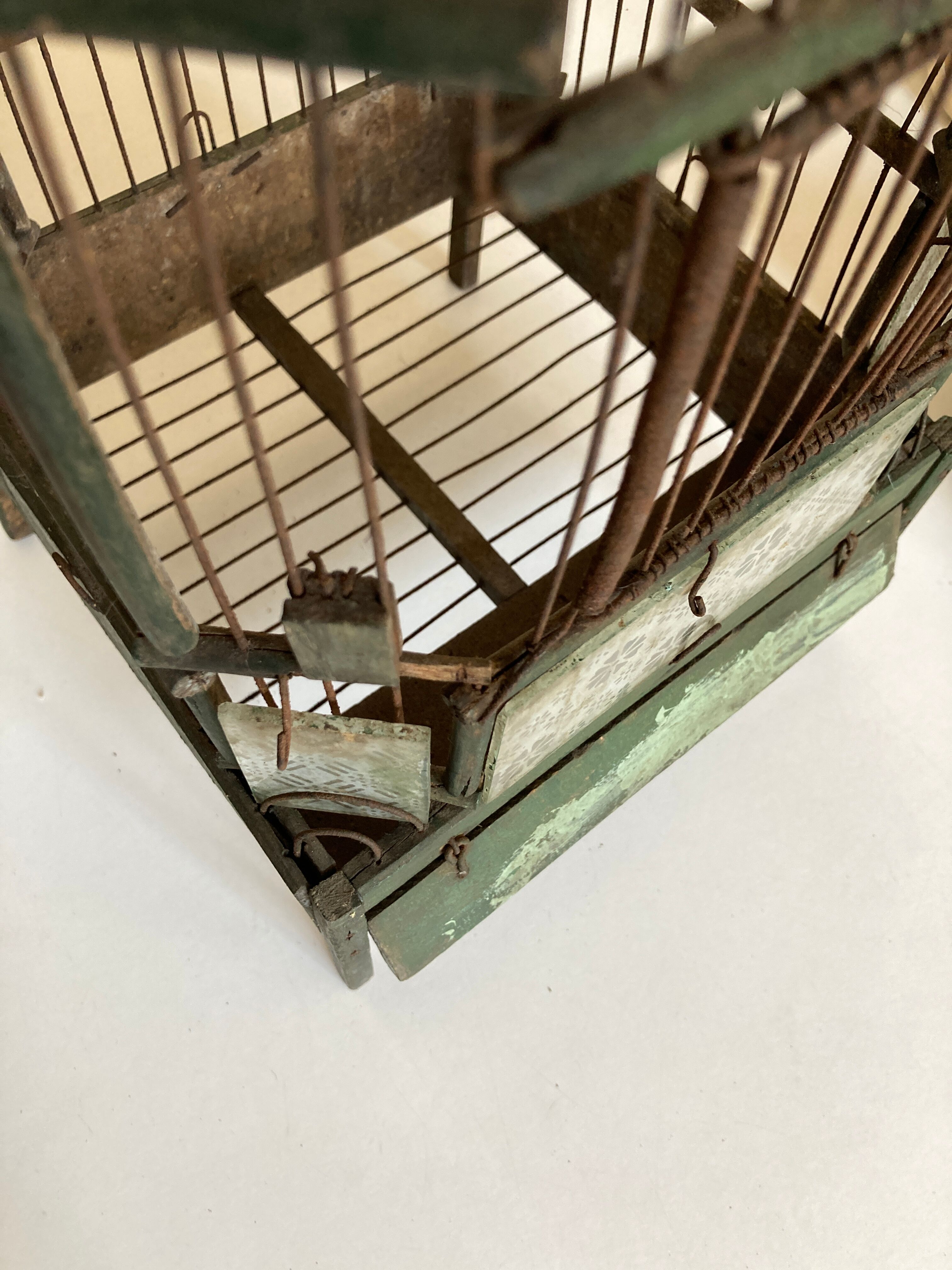 Octagonal bird cage made of wood and wire around 1920