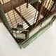 Octagonal bird cage made of wood and wire around 1920