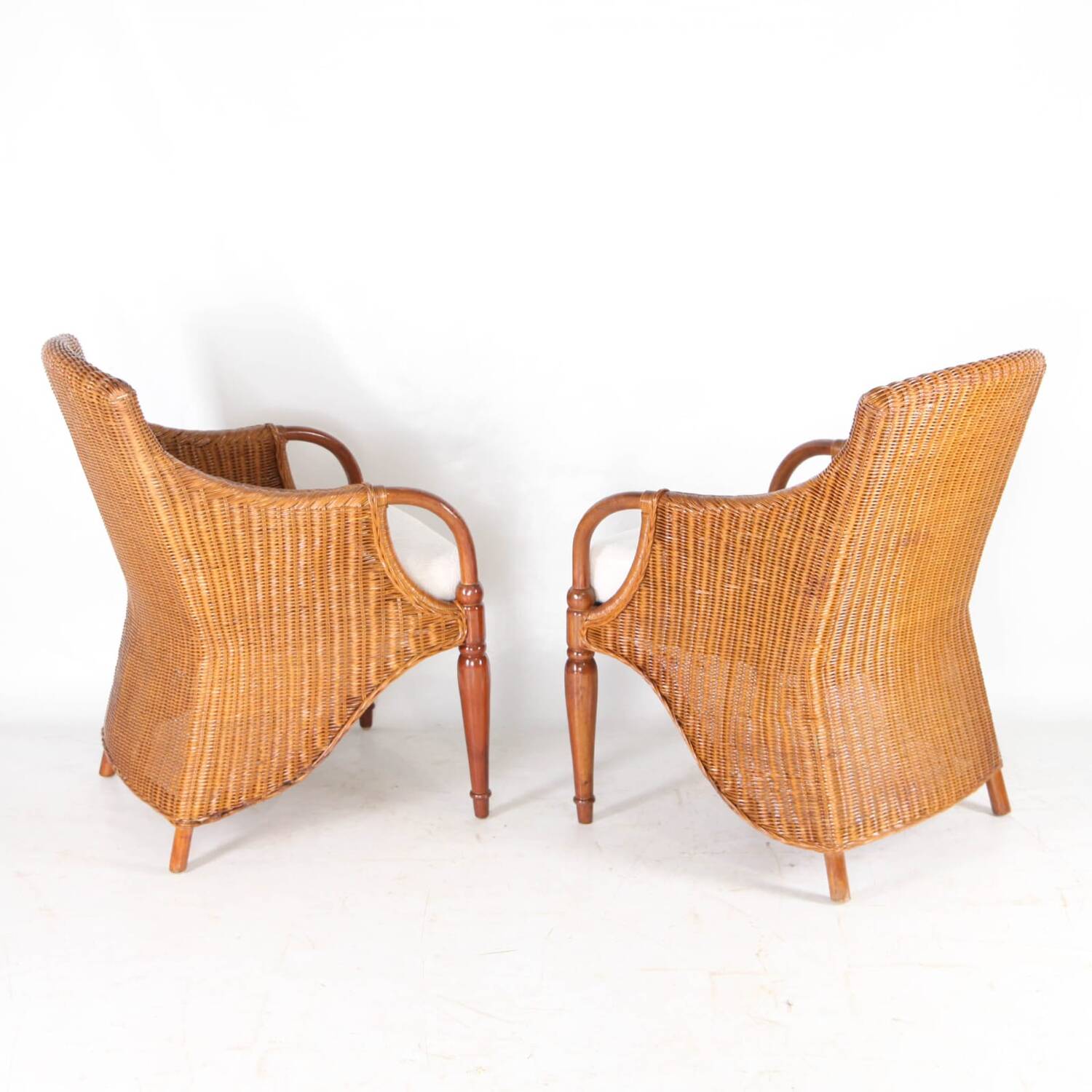 Pair of wooden and wicker armchairs