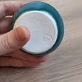 Small handmade turquoise pottery.