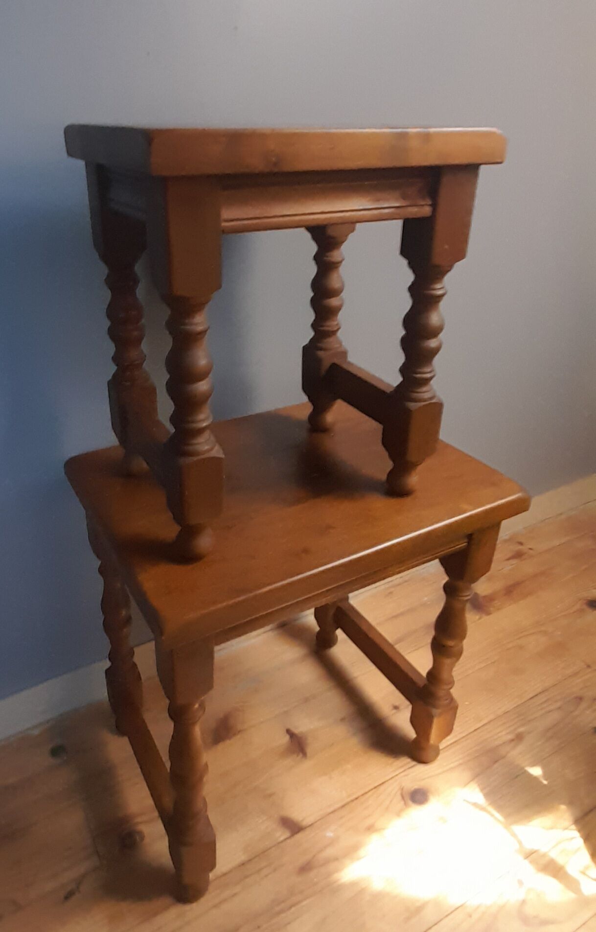 2 solid wood trundle tables, turned legs 80