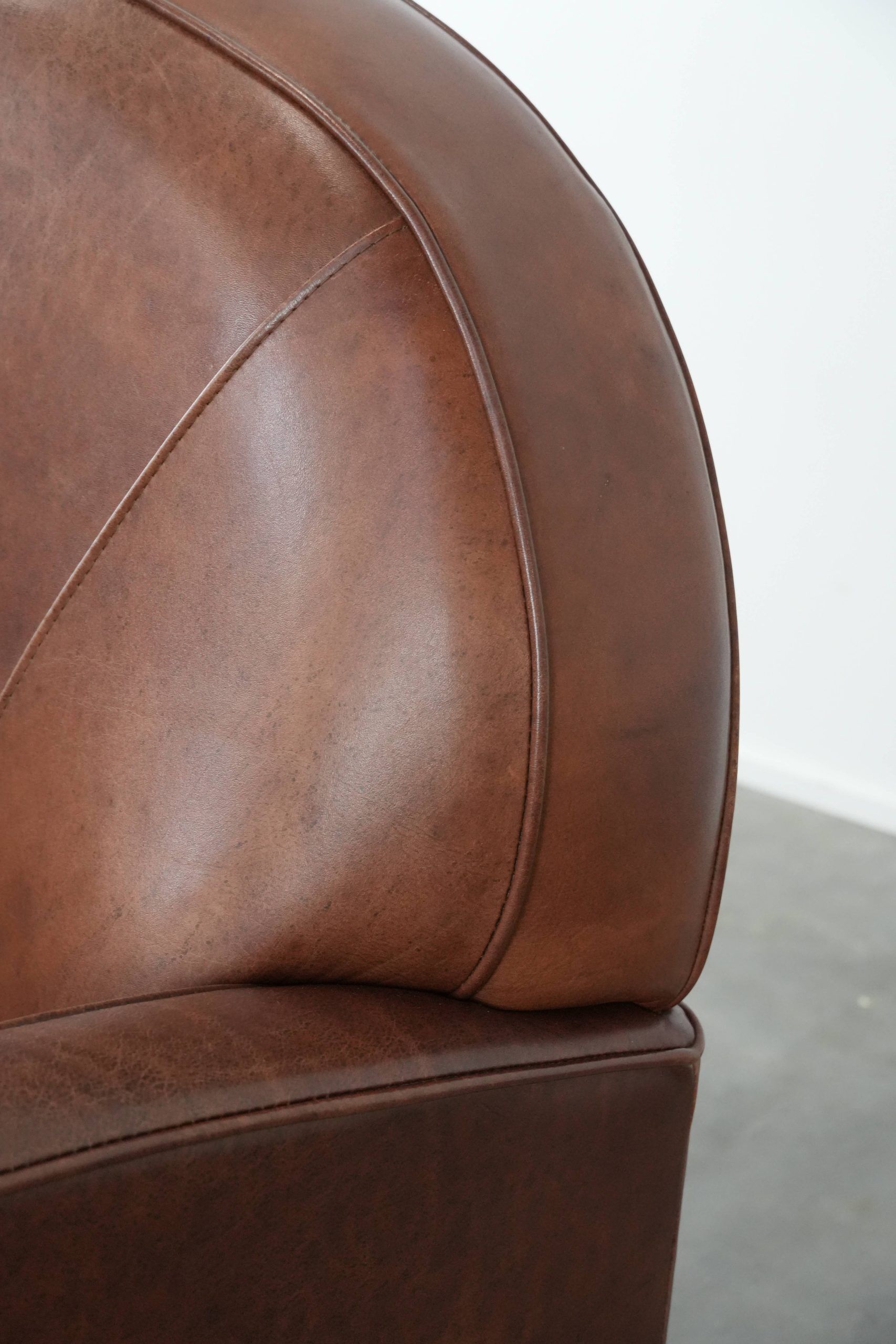 Beautiful art deco design armchair made of cowhide leather in English style