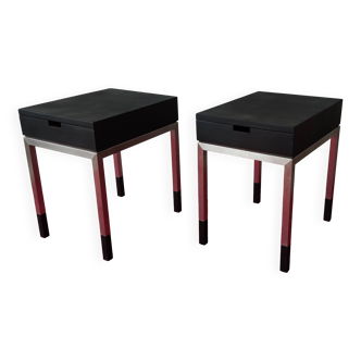 A pair of minimalist bedside tables