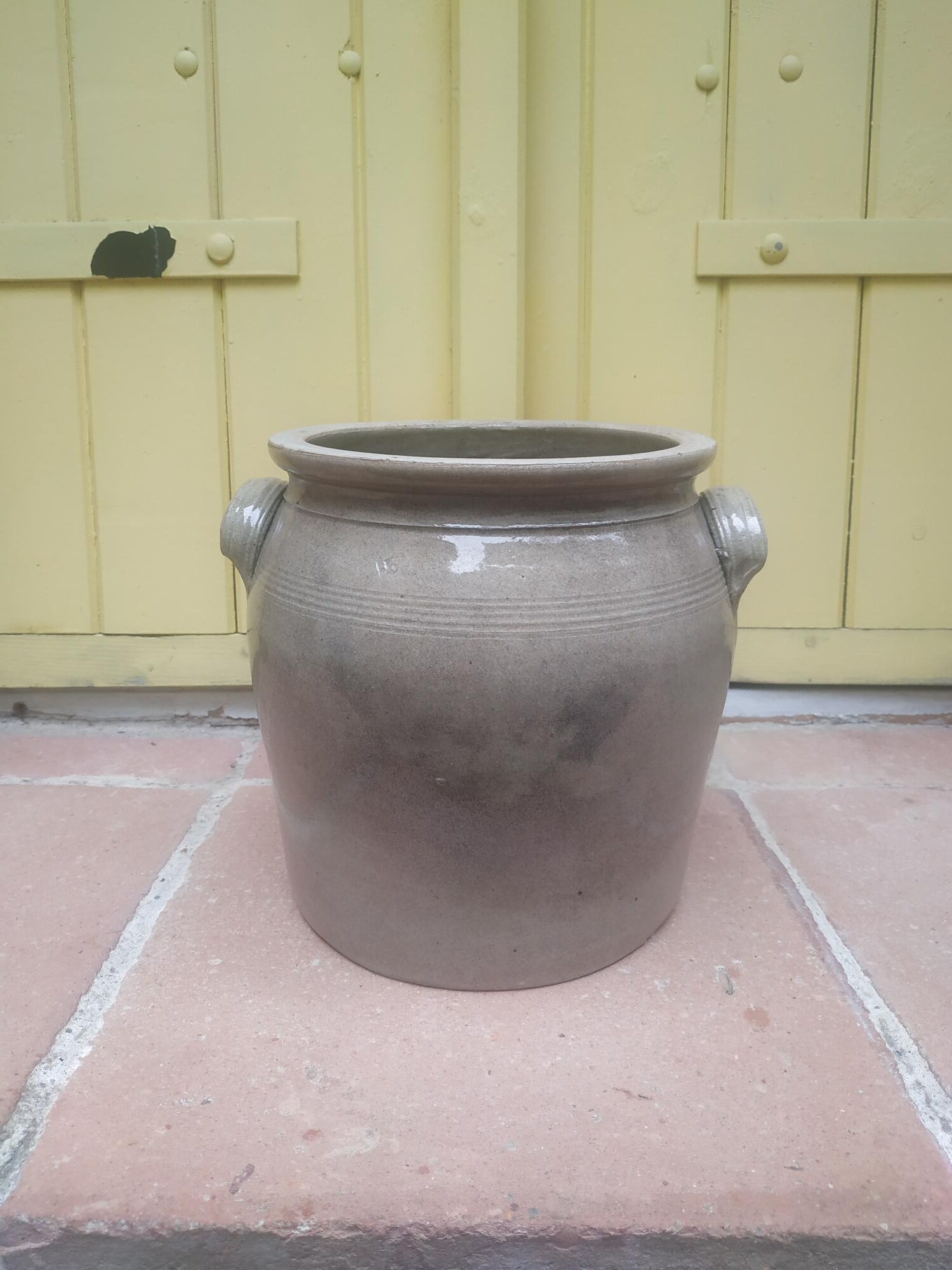 Old grease maker with two handles in gray glazed sandstone early 20th century