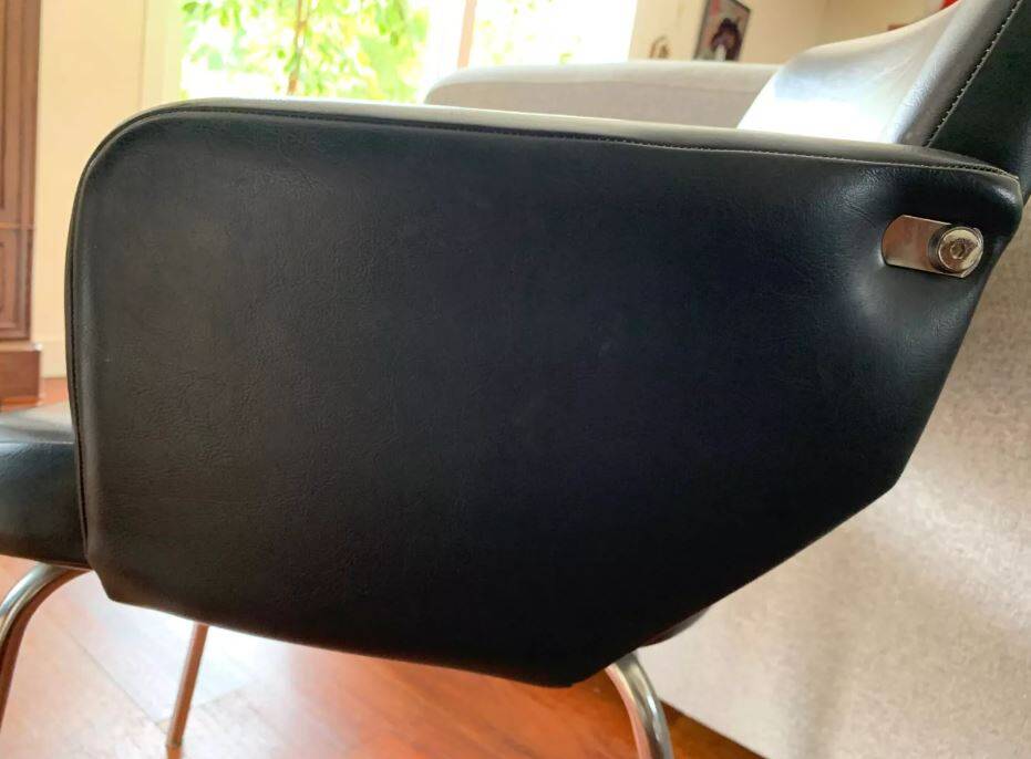 Black leatherette conference armchair