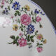 7 dessert plates Bernardaud Limoges porcelain with floral decoration from the 1920s to 1950s.