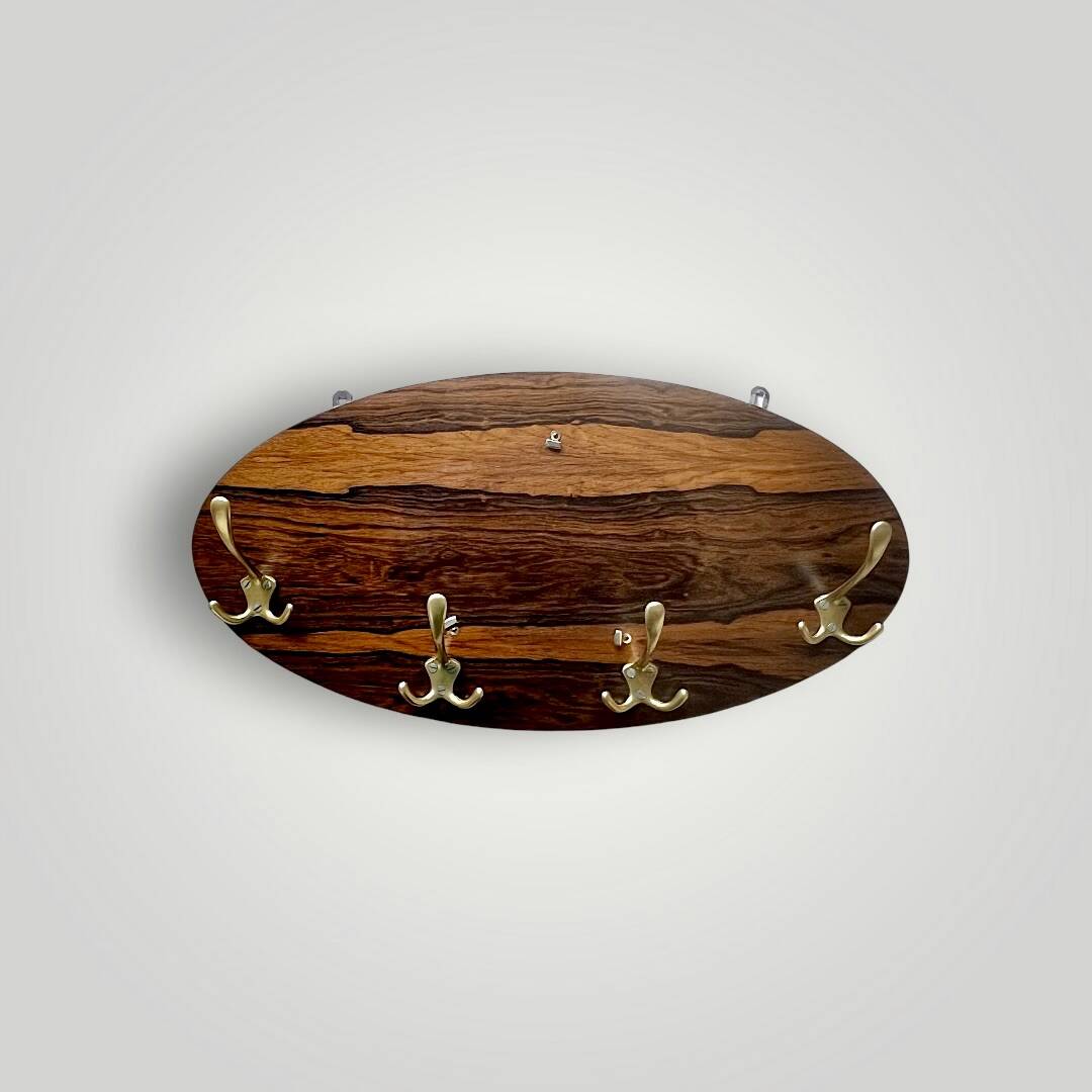 Vintage wall-mounted coat rack in wood and gold-tone aluminum – 1960s