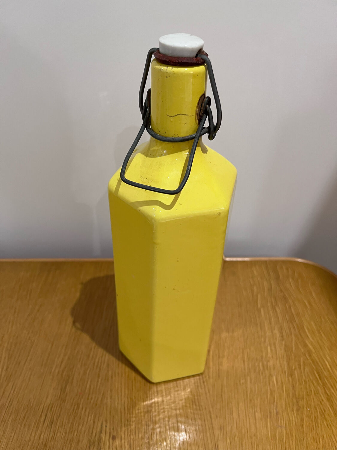 Yellow ceramic bottle