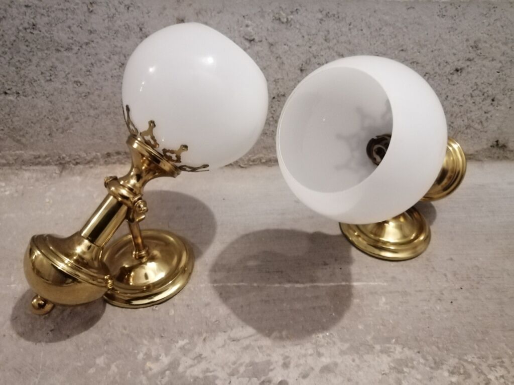 Pair of brass boat swivel appliques - opalin glass globe