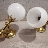 Pair of brass boat swivel appliques - opalin glass globe