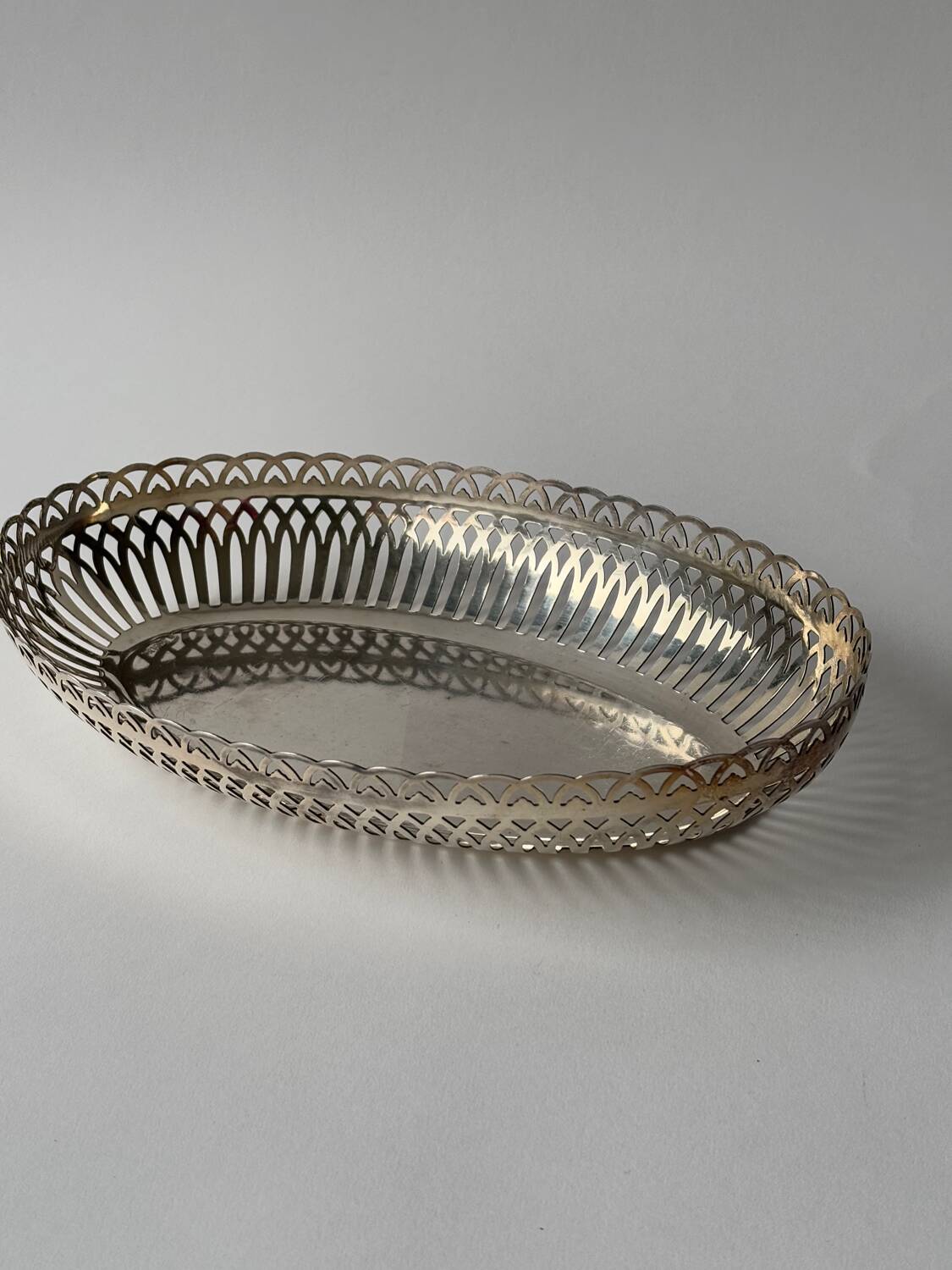 Vintage openwork basket in silver metal