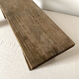 Low stool in raw wood