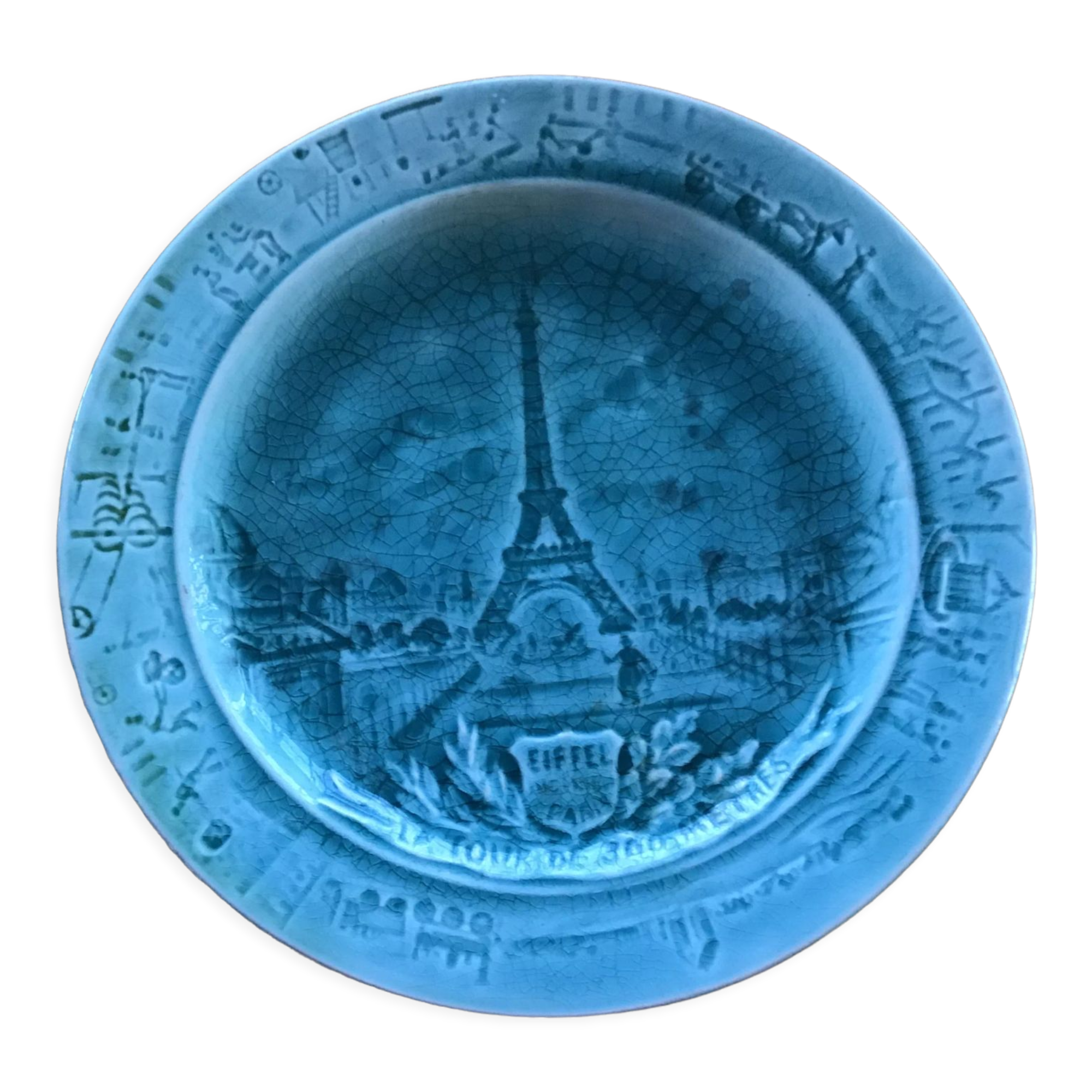 Cracked earthenware plate the Eiffel Tower