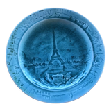 Cracked earthenware plate the Eiffel Tower