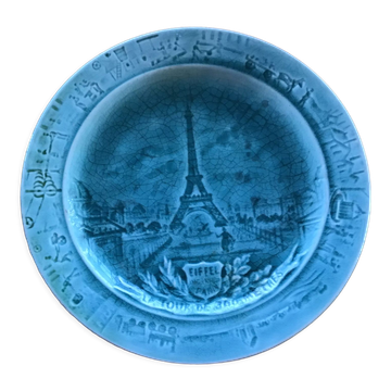 Cracked earthenware plate the Eiffel Tower