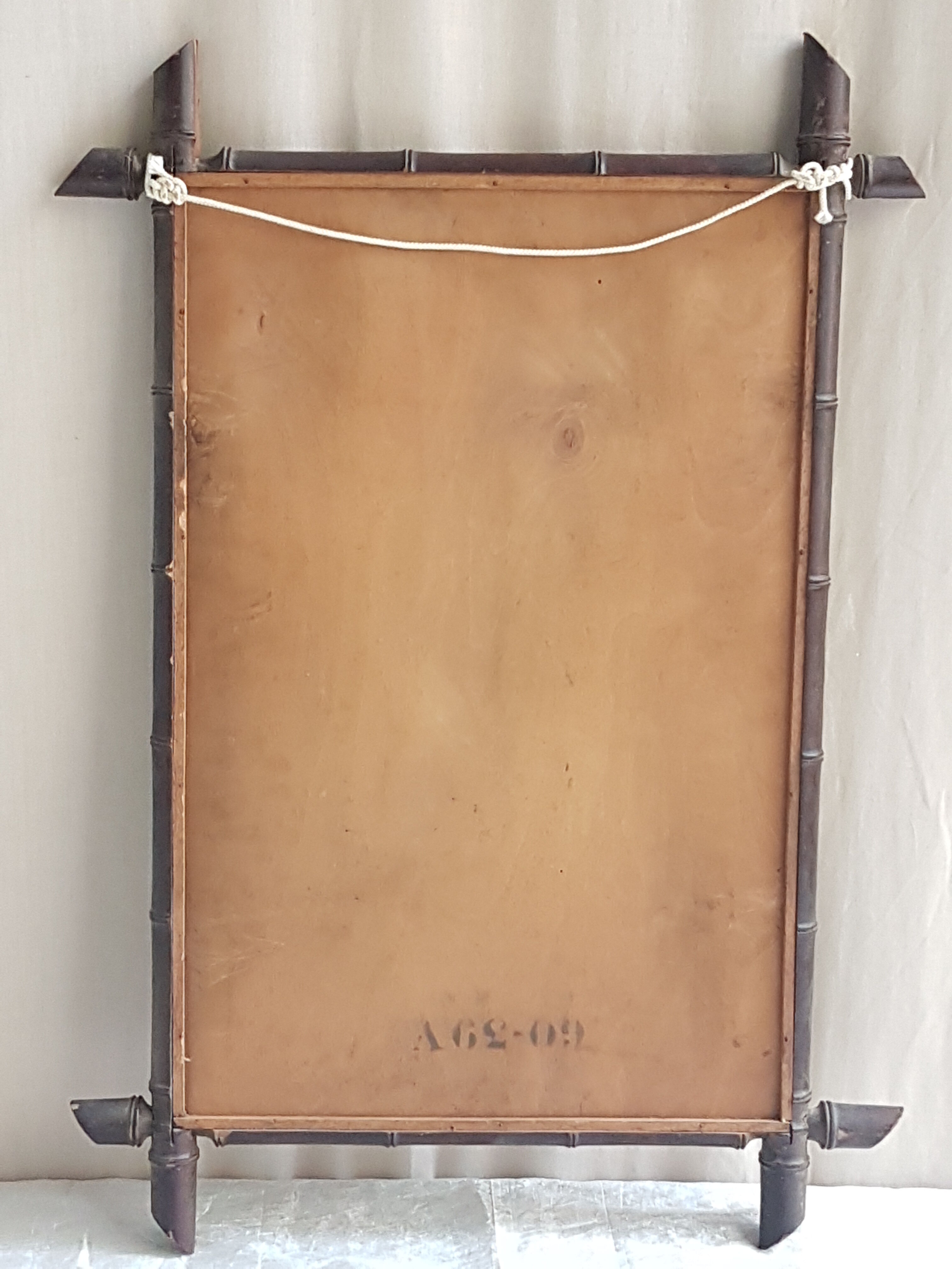 Ancient rattan mirror "78 x 54.5 cms"