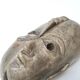 Patinated plaster sculpture paper press: Inverted faces