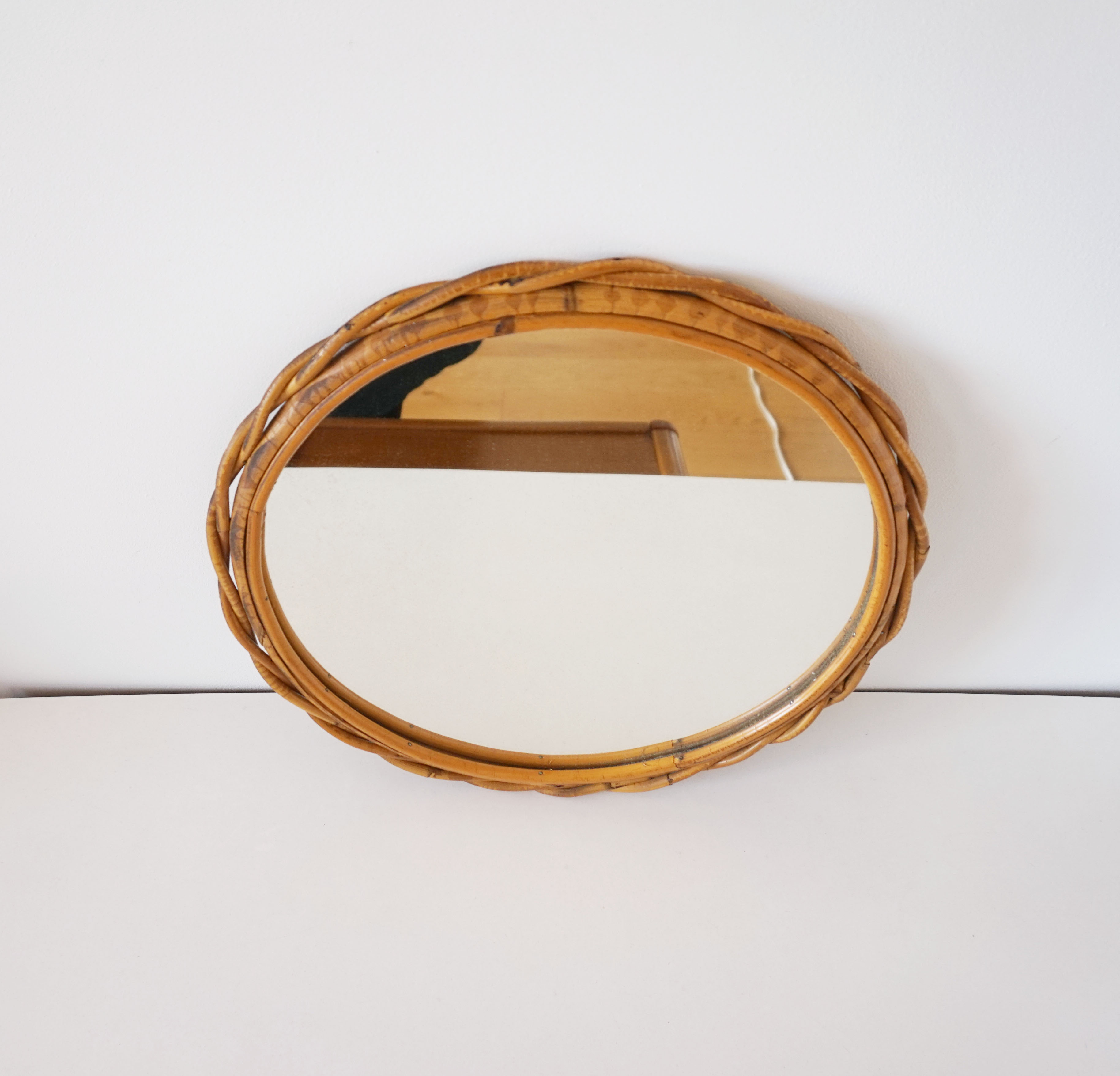 Vintage rattan sun mirror