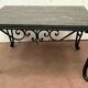 Table basse en fer forgé et marbre XX siècle