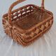 Old wicker basket with diamond-shaped decorations