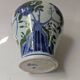 Porcelain vase, Asian art, hand-painted floral decoration.