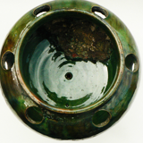 details on old bulb pot in glazed earthenware