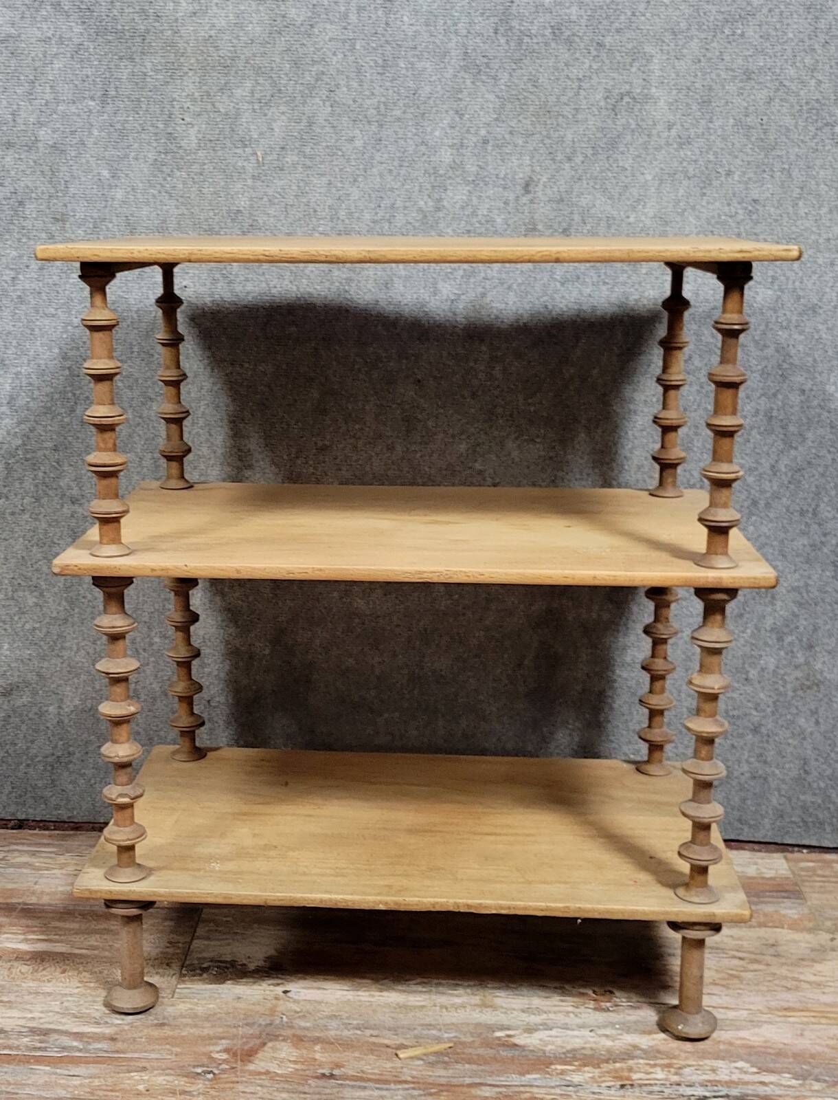 Natural wood display shelf with three tiers