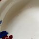 Saint Amand hollow plates decorated with red and blue flowers