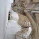 Pair of planter vases decorated with faces in reconstituted stone 1950s