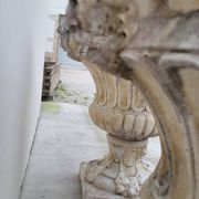 Pair of planter vases decorated with faces in reconstituted stone 1950s