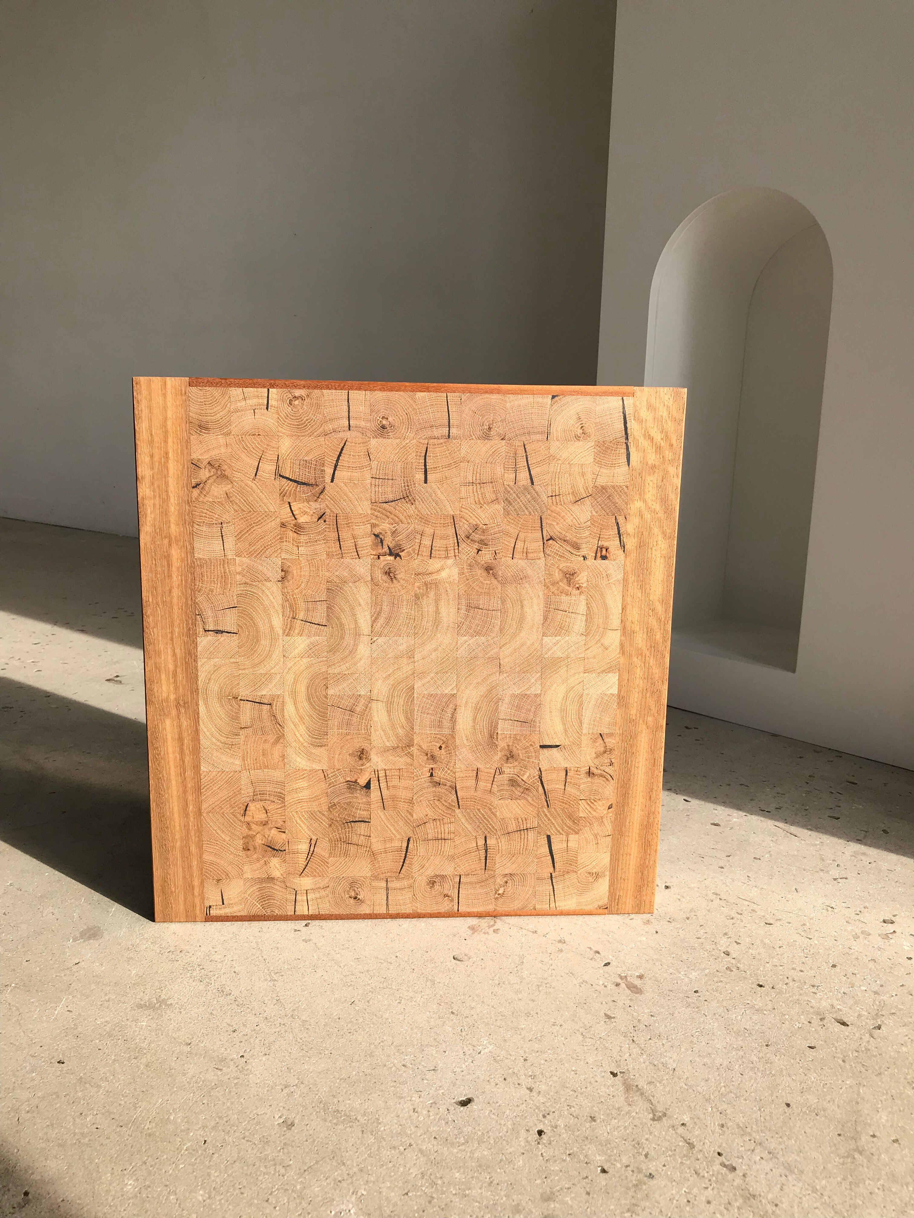 Decorative wooden top with checkerboard effect
