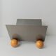 Silver metal magazine rack with wooden ball feet - Space Age 1980s retro storage