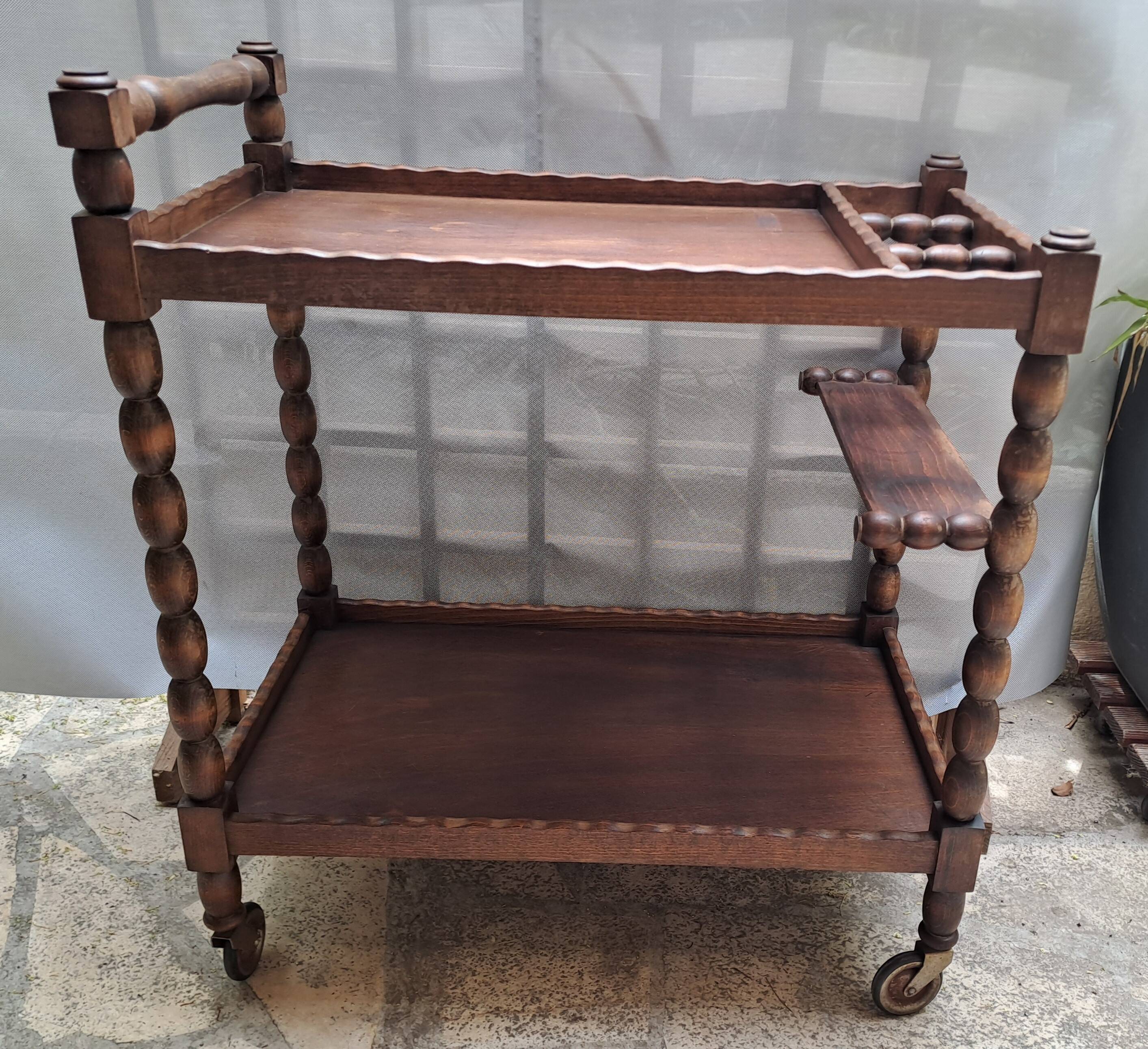 Dessert, table with wheels, side table in solid wood stained brown color France 1960