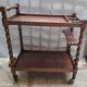 Dessert, table with wheels, side table in solid wood stained brown color France 1960