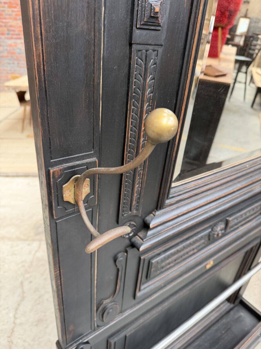 Patinated oak wardrobe from the early 20th century.