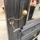 Patinated oak wardrobe from the early 20th century.